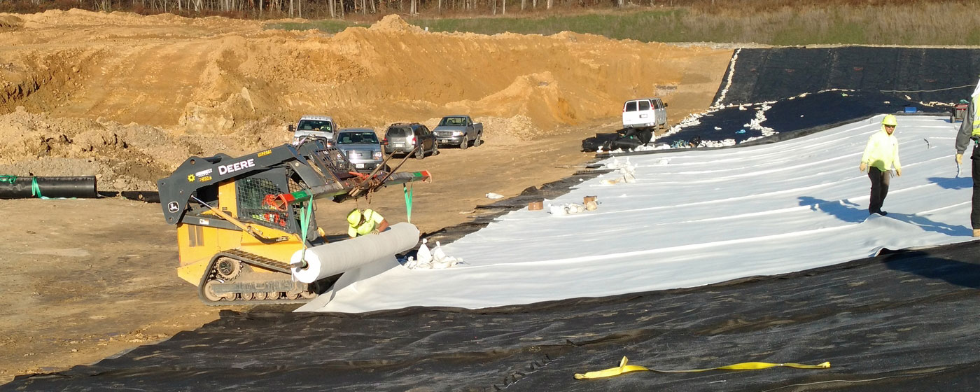 A layer of geosynthetic clay liner is installed at Seneca Landfill in Pennsylvania. This liner is part of a liner system that captures methane, which is processed into renewable natural gas to fuel the company's waste collection trucks.